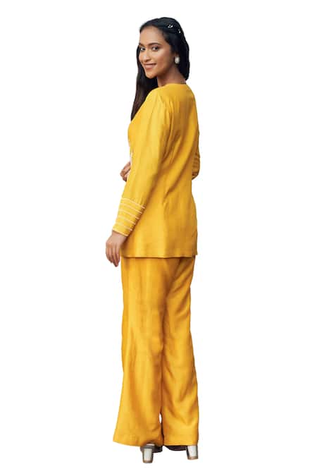 Megha Pitti_Yellow Silk Cut Work, Beads V-neck Cutdana Embroidered Top And Flared Pant Set _Online_at_Aza_Fashions