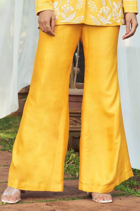 Buy_Megha Pitti_Yellow Silk Cut Work, Beads V-neck Cutdana Embroidered Top And Flared Pant Set _Online_at_Aza_Fashions