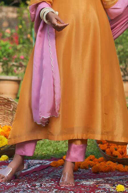 Megha Pitti_Yellow Organza, Tissue Tassels, Embroidery Keyhole Neck Floral Sleeve Kurta Set _Online_at_Aza_Fashions