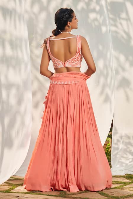 Shop Megha Pitti Peach Crepe, Satin Pearls Asymmetric Embroidered Lehenga Set at Aza Fashions Shop_Megha Pitti_Peach Crepe, Satin Pearls Asymmetric Embroidered Lehenga Set _at_Aza_Fashions