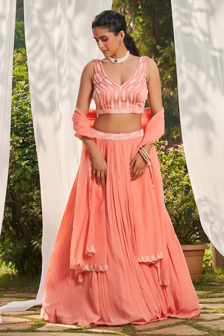 Megha Pitti Peach Crepe, Satin Pearls Asymmetric Embroidered Lehenga Set at Aza Fashions Megha Pitti_Peach Crepe, Satin Pearls Asymmetric Embroidered Lehenga Set _at_Aza_Fashions
