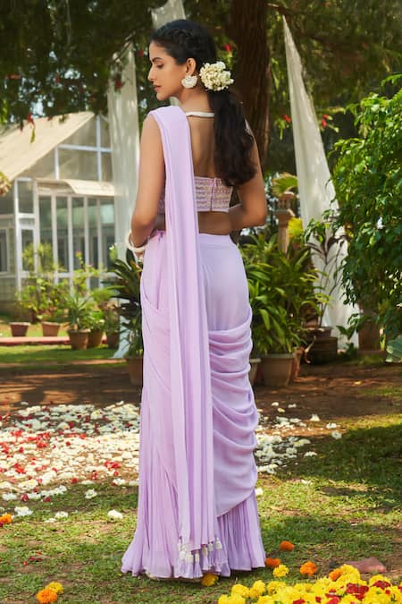 Shop Megha Pitti Purple Georgette Sequins, Cut Work, Pearls Pre-draped Fushcut Saree With Blouse at Aza Fashions Shop_Megha Pitti_Purple Georgette Sequins, Cut Work, Pearls Pre-draped Fushcut Saree With Blouse _at_Aza_Fashions