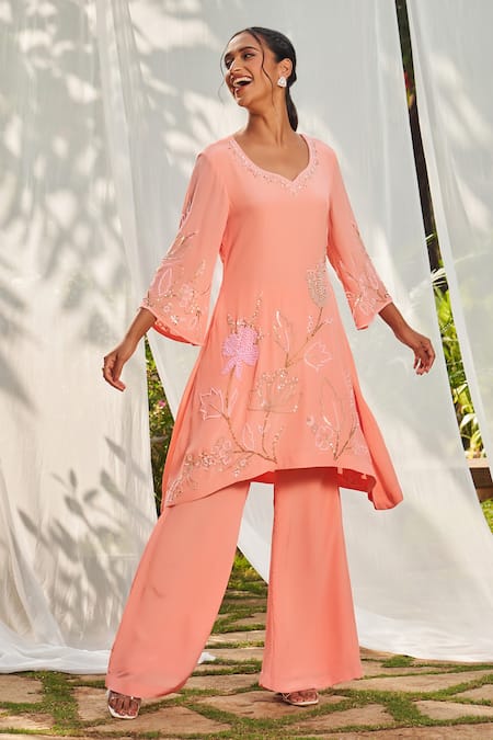 Buy Megha Pitti Peach Crepe Sequins, Cut Work Open And Cutdana Embroidered Tunic & Flared Pant Set Buy_Megha Pitti_Peach Crepe Sequins, Cut Work Open And Cutdana Embroidered Tunic & Flared Pant Set