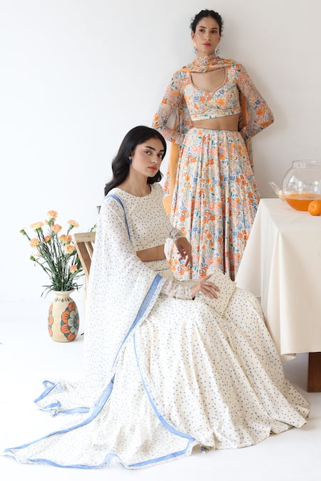 Shop_Baise Gaba_Off White Ruffles Polkapsoh Printed Clutch _at_Aza_Fashions