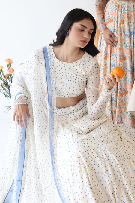 Baise Gaba_Off White Ruffles Polkapsoh Printed Clutch _Online_at_Aza_Fashions