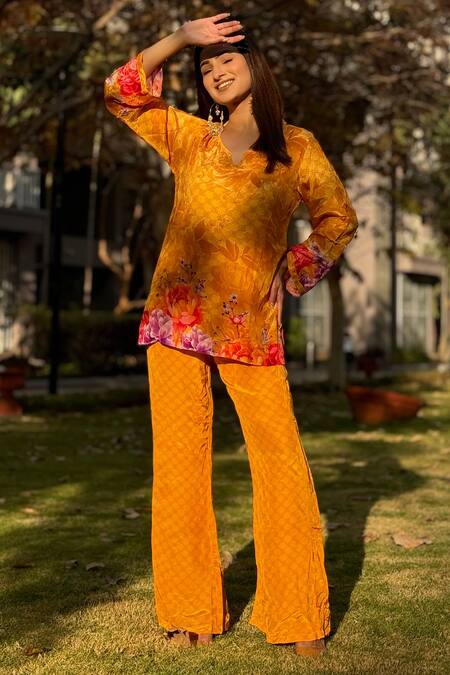 Buy_Be Chic_Yellow Crepe Collared Dewdrop Flora Print Top With Bootcut Pant _Online_at_Aza_Fashions