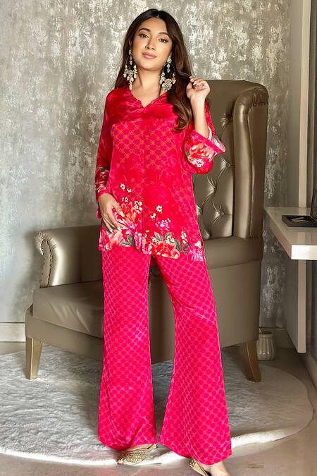 Be Chic Pink Crepe Collared Plumeria Flora Print Top With Bootcut Pant at Aza Fashions Be Chic_Pink Crepe Collared Plumeria Flora Print Top With Bootcut Pant _at_Aza_Fashions