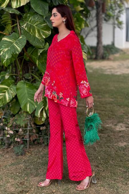Buy Be Chic Pink Crepe Collared Plumeria Flora Print Top With Bootcut Pant Buy_Be Chic_Pink Crepe Collared Plumeria Flora Print Top With Bootcut Pant