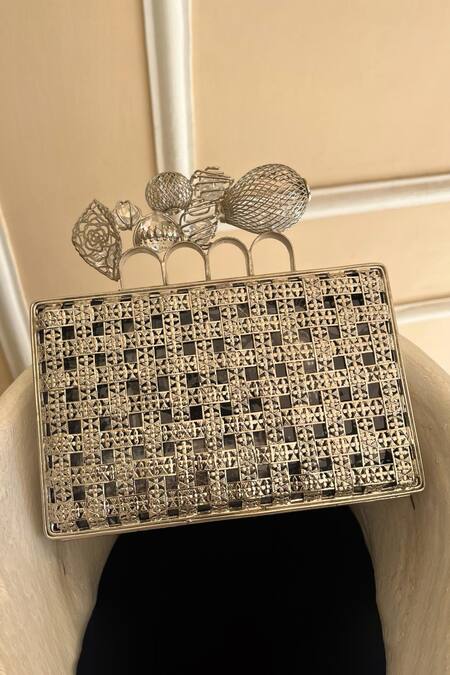 Shop Adwita Bags & Jewels Silver Cut Work Zarrin Geometric Carved Clutch at Aza Fashions Shop_Adwita Bags & Jewels_Silver Cut Work Zarrin Geometric Carved Clutch _at_Aza_Fashions