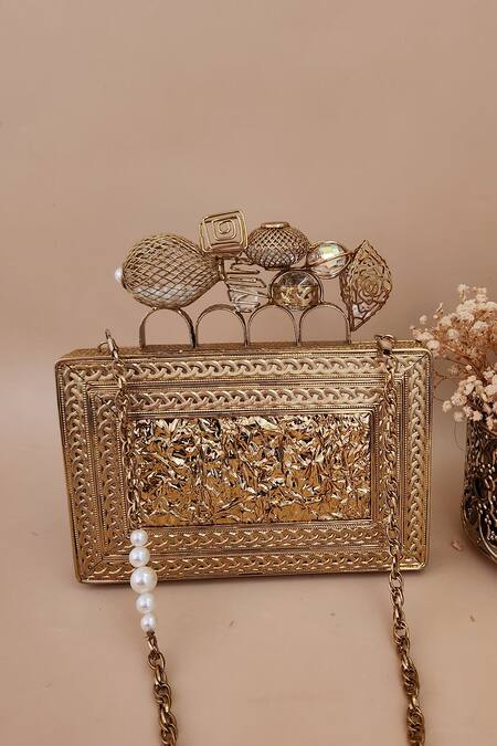 Shop Adwita Bags & Jewels Gold Mother Of Pearl Zarin Embellished Clutch at Aza Fashions Shop_Adwita Bags & Jewels_Gold Mother Of Pearl Zarin Embellished Clutch _at_Aza_Fashions