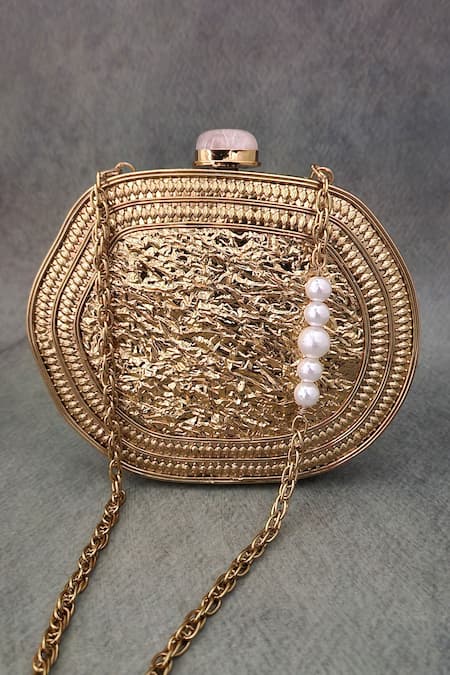 Shop Adwita Bags & Jewels Gold Mother Of Pearl Elnara Embellished Clutch at Aza Fashions Shop_Adwita Bags & Jewels_Gold Mother Of Pearl Elnara Embellished Clutch _at_Aza_Fashions