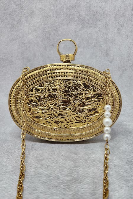 Shop Adwita Bags & Jewels Gold Crystals Alexandra Floral Carved Bag at Aza Fashions Shop_Adwita Bags & Jewels_Gold Crystals Alexandra Floral Carved Bag _at_Aza_Fashions