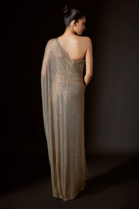 Shop Itrh Gold Net Crystals, Stones Scarab Embellished Pre-stitched Saree With Corset at Aza Fashions Shop_Itrh_Gold Net Crystals, Stones Scarab Embellished Pre-stitched Saree With Corset _at_Aza_Fashions