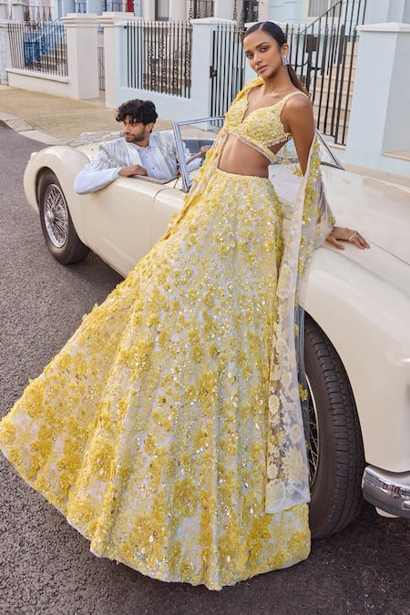 Seema Gujral_Yellow Net Pearls, Sequins, Crystals, Cut Work 3d Floral Embroidered Lehenga Set_Online_at_Aza_Fashions