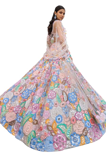 Seema Gujral_Ivory Net Sequins, Beads, Pearls, Tassels Pastel Floral Embroidered Lehenga Set_at_Aza_Fashions