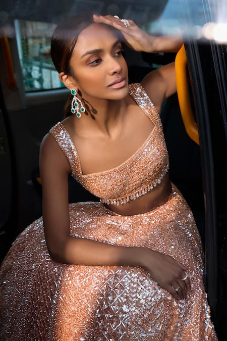 Buy_Seema Gujral_Peach Net Tassels, Sequins Sweetheart Neck Embroidered Bridal Lehenga Set _Online_at_Aza_Fashions
