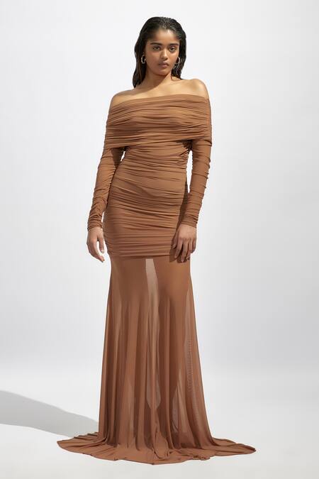 Deme By Gabriella Beige Net Off-shoulder Solid Ruched Dress at Aza Fashions Deme By Gabriella_Beige Net Off-shoulder Solid Ruched Dress _at_Aza_Fashions