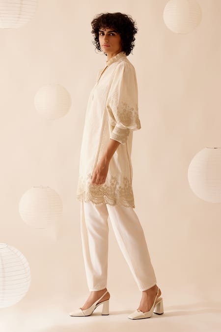 Shop Bunka Ivory 100% Cotton Embellished Floral Lace Ruffle Slava Tunic Online at Aza Fashions Shop_Bunka_Ivory 100% Cotton Embellished Floral Lace Ruffle Slava Tunic _Online_at_Aza_Fashions