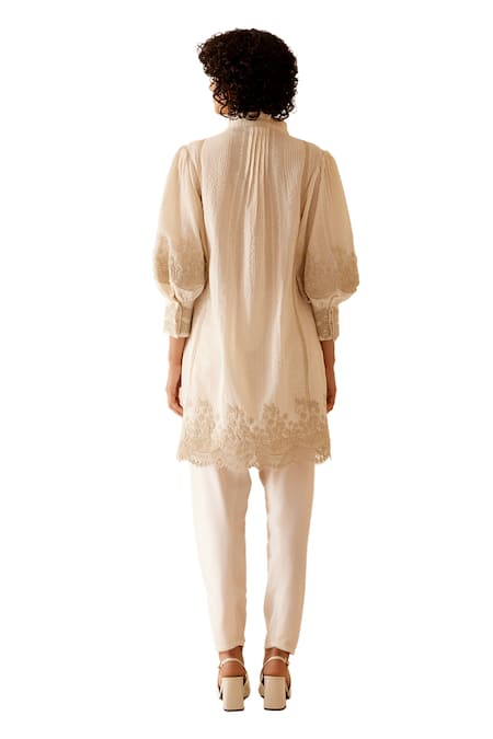 Buy Bunka Ivory 100% Cotton Embellished Floral Lace Ruffle Slava Tunic Buy_Bunka_Ivory 100% Cotton Embellished Floral Lace Ruffle Slava Tunic