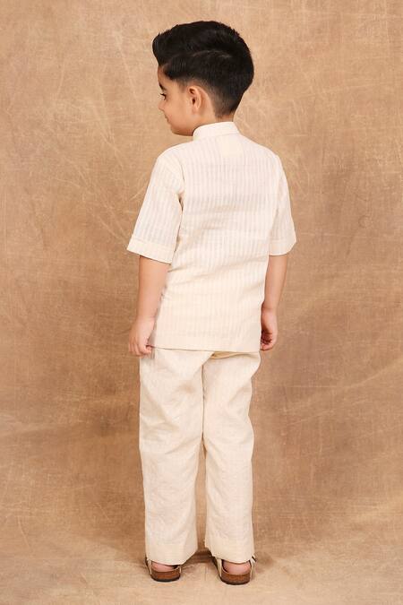 Shop The Right Cut Ivory Handloom Cotton Embroidery Palm Tree Kids Shirt at Aza Fashions Shop_The Right Cut_Ivory Handloom Cotton Embroidery Palm Tree Kids Shirt_at_Aza_Fashions