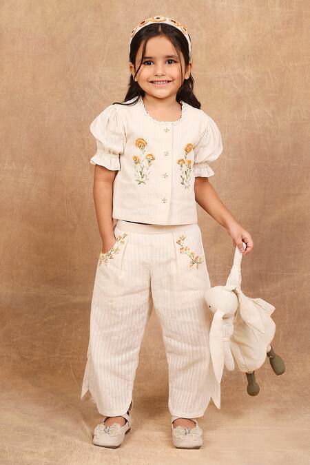 The Right Cut_Ivory Handloom , Embroidery Floral Top And Pant Set_at_Aza_Fashions