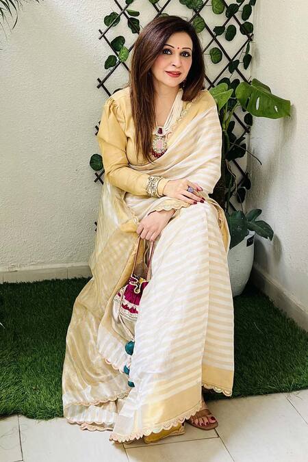 Buy Zal From Benaras Cream Chanderi Stripe Pattern Saree With Unstitched Blouse Piece Online at Aza Fashions Buy_Zal From Benaras_Cream Chanderi Stripe Pattern Saree With Unstitched Blouse Piece _Online_at_Aza_Fashions