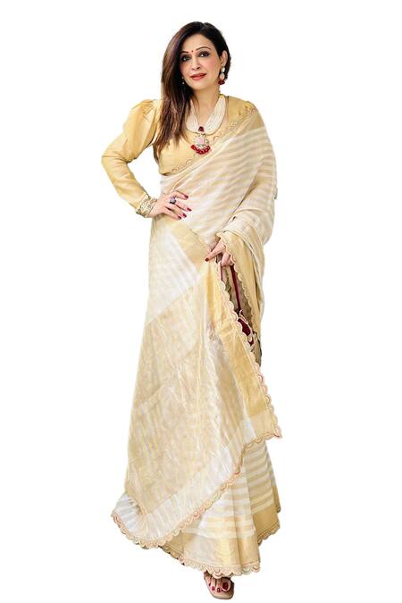 Zal From Benaras Cream Chanderi Stripe Pattern Saree With Unstitched Blouse Piece at Aza Fashions Zal From Benaras_Cream Chanderi Stripe Pattern Saree With Unstitched Blouse Piece _at_Aza_Fashions