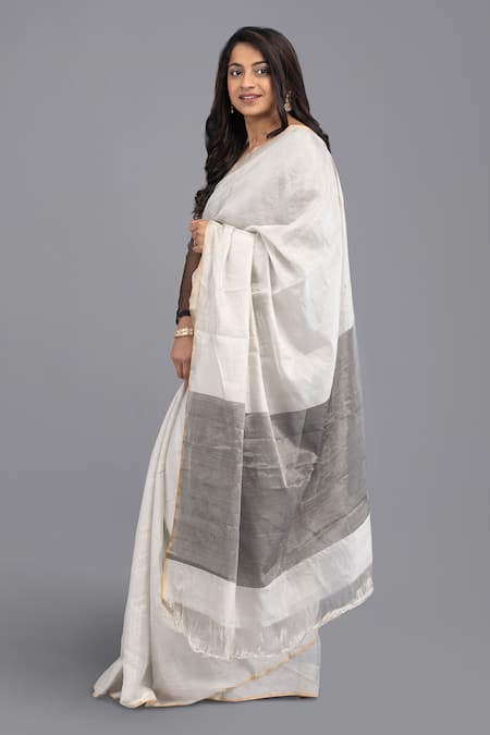 Zal From Benaras Silver Chanderi Silk Contrast Hem Solid Saree With Unstitched Blouse Piece Online at Aza Fashions Zal From Benaras_Silver Chanderi Silk Contrast Hem Solid Saree With Unstitched Blouse Piece _Online_at_Aza_Fashions