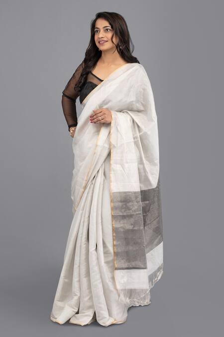 Zal From Benaras Silver Chanderi Silk Contrast Hem Solid Saree With Unstitched Blouse Piece at Aza Fashions Zal From Benaras_Silver Chanderi Silk Contrast Hem Solid Saree With Unstitched Blouse Piece _at_Aza_Fashions