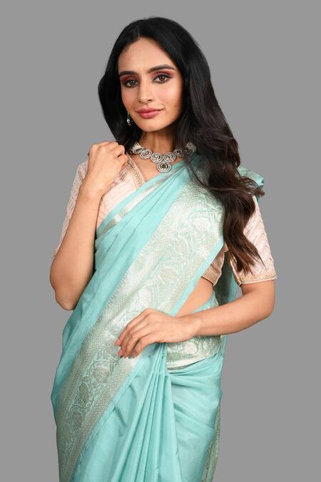Zal From Benaras_Green Silk Embroidery Floral Hand Woven Hem Saree With Unstitched Blouse Piece _at_Aza_Fashions