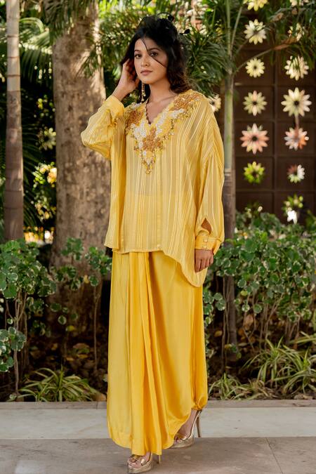 Nikita Vishakha Yellow Crepe, Lurex Beads, Tassels V-neck Embroidered Top And Skirt Set at Aza Fashions Nikita Vishakha_Yellow Crepe, Lurex Beads, Tassels V-neck Embroidered Top And Skirt Set _at_Aza_Fashions