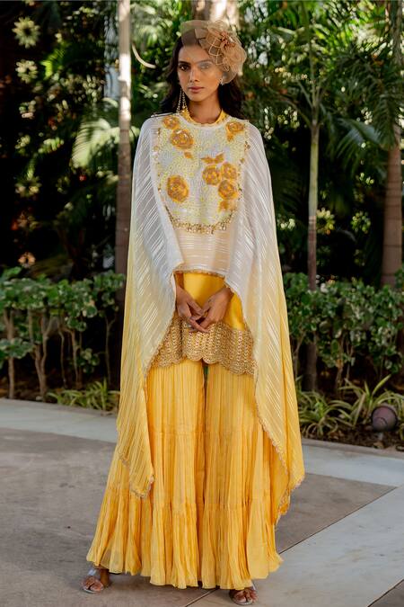 Shop Nikita Vishakha Yellow Silk, Lurex Beads, Tassels Round Neck Embroidered Cape Gharara Set Online at Aza Fashions Shop_Nikita Vishakha_Yellow Silk, Lurex Beads, Tassels Round Neck Embroidered Cape Gharara Set _Online_at_Aza_Fashions