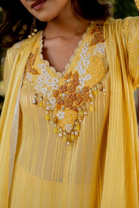 Nikita Vishakha Yellow Silk, Lurex Embroidery, Beads, Tassels V-neck Kurta Set With Cape at Aza Fashions Nikita Vishakha_Yellow Silk, Lurex Embroidery, Beads, Tassels V-neck Kurta Set With Cape _at_Aza_Fashions