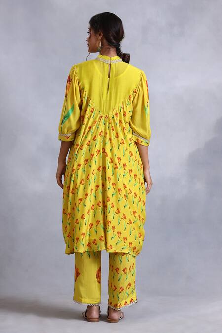 Shop_Radhika Jindal_Yellow Cotton, Silk Sequins, Lace Round Draped Floral Pattern Kurta Pant Set_at_Aza_Fashions