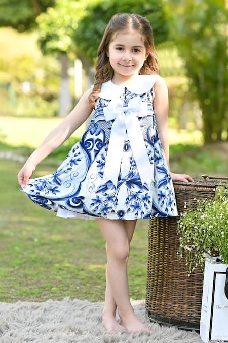 Shop The Pony & Peony Co. Blue Rayon, Cotton Bows Bohemian Fleur Print Dress at Aza Fashions Shop_The Pony & Peony Co._Blue Rayon, Cotton Bows Bohemian Fleur Print Dress _at_Aza_Fashions