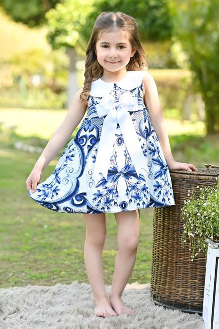 The Pony & Peony Co. Blue Rayon, Cotton Bows Bohemian Fleur Print Dress Online at Aza Fashions The Pony & Peony Co._Blue Rayon, Cotton Bows Bohemian Fleur Print Dress _Online_at_Aza_Fashions