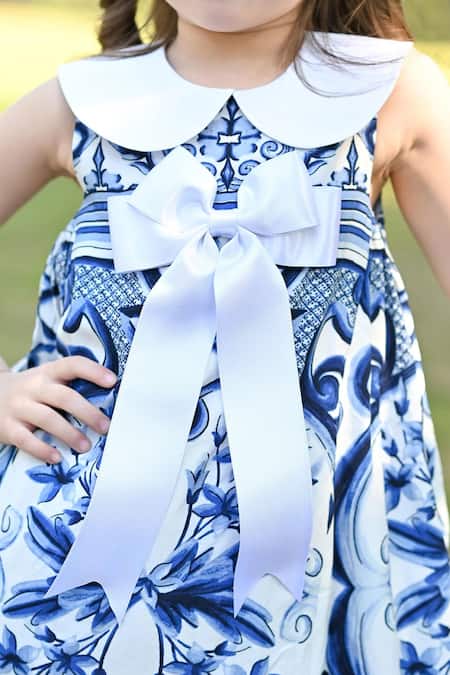 Buy The Pony & Peony Co. Blue Rayon, Cotton Bows Bohemian Fleur Print Dress Online at Aza Fashions Buy_The Pony & Peony Co._Blue Rayon, Cotton Bows Bohemian Fleur Print Dress _Online_at_Aza_Fashions