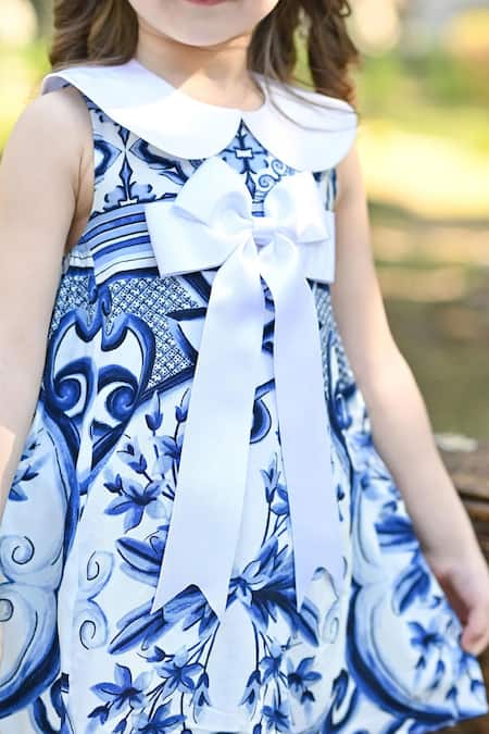 Shop The Pony & Peony Co. Blue Rayon, Cotton Bows Bohemian Fleur Print Dress Online at Aza Fashions Shop_The Pony & Peony Co._Blue Rayon, Cotton Bows Bohemian Fleur Print Dress _Online_at_Aza_Fashions