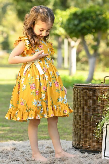 The Pony & Peony Co. Yellow Rayon, Cotton Bows Poppy Blossom Print Dress Online at Aza Fashions The Pony & Peony Co._Yellow Rayon, Cotton Bows Poppy Blossom Print Dress _Online_at_Aza_Fashions