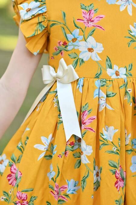 Buy The Pony & Peony Co. Yellow Rayon, Cotton Bows Poppy Blossom Print Dress Online at Aza Fashions Buy_The Pony & Peony Co._Yellow Rayon, Cotton Bows Poppy Blossom Print Dress _Online_at_Aza_Fashions
