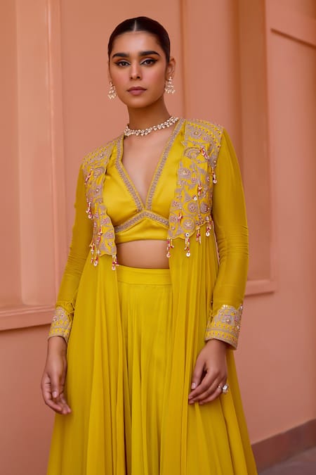 ISHA GUPTA TAYAL Yellow Satin, Organza Gota Patti, Pearls, Mastani Embroidered Cape Sharara Set at Aza Fashions ISHA GUPTA TAYAL_Yellow Satin, Organza Gota Patti, Pearls, Mastani Embroidered Cape Sharara Set _at_Aza_Fashions
