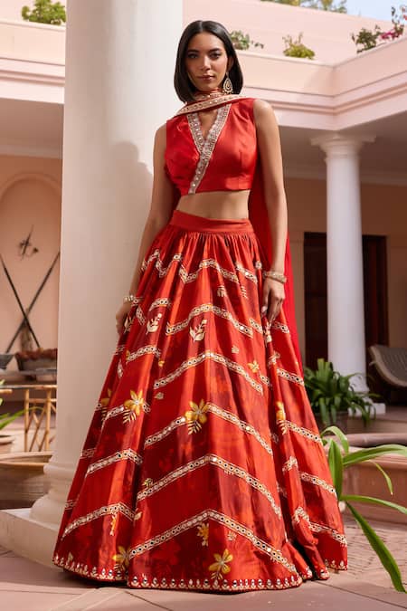 Buy ISHA GUPTA TAYAL Red Satin, Organza, Silk Embroidery, Mirrors Shringar Floral Print Lehenga Set Online at Aza Fashions Buy_ISHA GUPTA TAYAL_Red Satin, Organza, Silk Embroidery, Mirrors Shringar Floral Print Lehenga Set _Online_at_Aza_Fashions