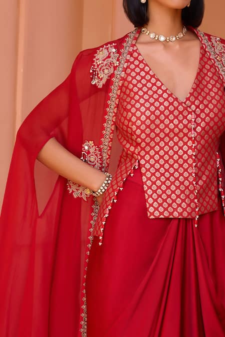 Buy_ISHA GUPTA TAYAL_Red Satin, Chanderi Beads V-neck Ratan Embroidered Cape Draped Skirt Set _Online_at_Aza_Fashions