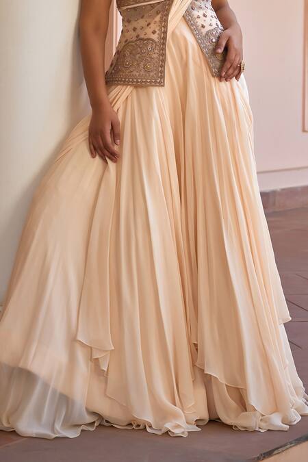 ISHA GUPTA TAYAL_White Net, Satin, Ambar Pre-draped Lehenga Saree With Embroidered Jacket _Online_at_Aza_Fashions