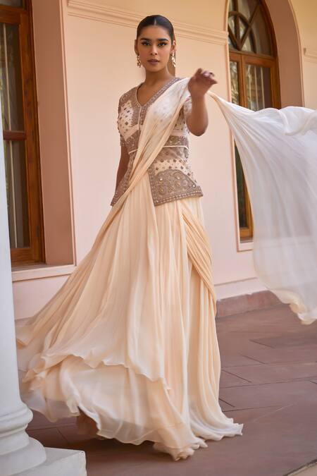 Shop_ISHA GUPTA TAYAL_White Net, Satin, Ambar Pre-draped Lehenga Saree With Embroidered Jacket _Online_at_Aza_Fashions