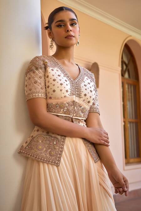 ISHA GUPTA TAYAL_White Net, Satin, Ambar Pre-draped Lehenga Saree With Embroidered Jacket _at_Aza_Fashions