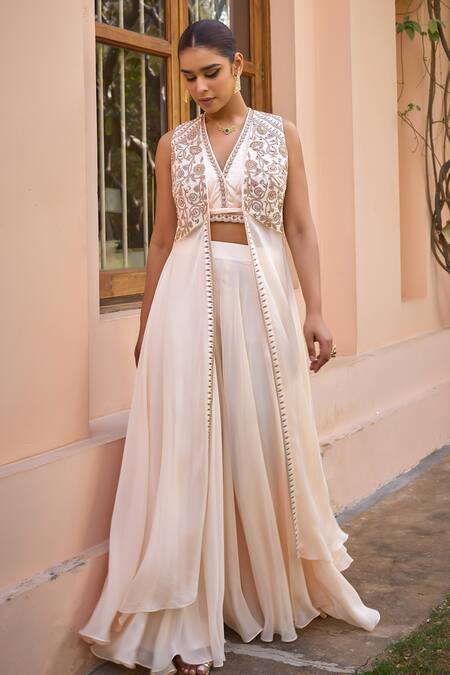 Shop ISHA GUPTA TAYAL White Satin, Organza Beads, Mirrors, Embroidery, Gota Patti Cape Sharara Set Online at Aza Fashions Shop_ISHA GUPTA TAYAL_White Satin, Organza Beads, Mirrors, Embroidery, Gota Patti Cape Sharara Set _Online_at_Aza_Fashions