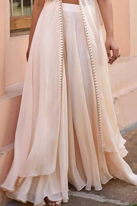 ISHA GUPTA TAYAL White Satin, Organza Beads, Mirrors, Embroidery, Gota Patti Cape Sharara Set at Aza Fashions ISHA GUPTA TAYAL_White Satin, Organza Beads, Mirrors, Embroidery, Gota Patti Cape Sharara Set _at_Aza_Fashions