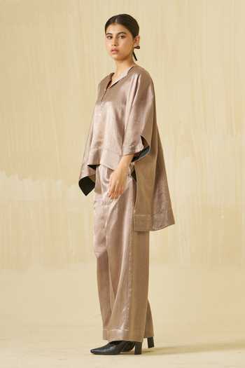 Buy Stoique Brown Mashru Silk Plain Pigeon Trouser Online at Aza Fashions Buy_Stoique_Brown Mashru Silk Plain Pigeon Trouser _Online_at_Aza_Fashions