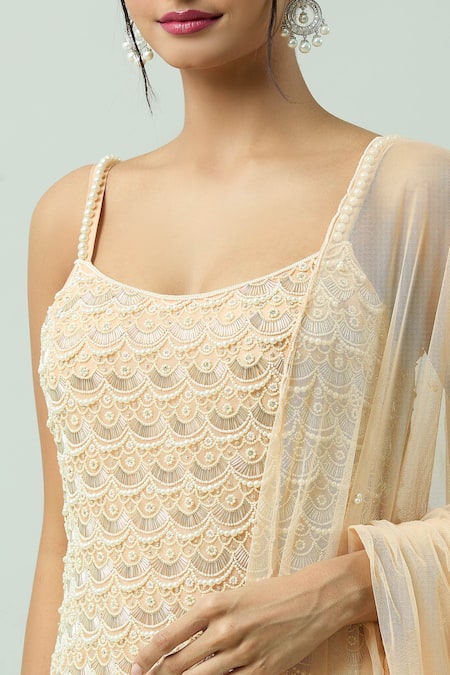 COUTURE BY NIHARIKA Peach Organza, Net, Viscose Pearls, Cut Work Scoop Embroidered Kurta Sharara Set Online at Aza Fashions COUTURE BY NIHARIKA_Peach Organza, Net, Viscose Pearls, Cut Work Scoop Embroidered Kurta Sharara Set _Online_at_Aza_Fashions
